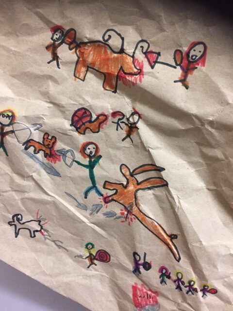 a cave drawing in crayon of a stoneage battle between man and byson