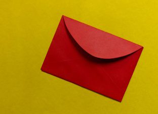 A red envelope on a yellow background