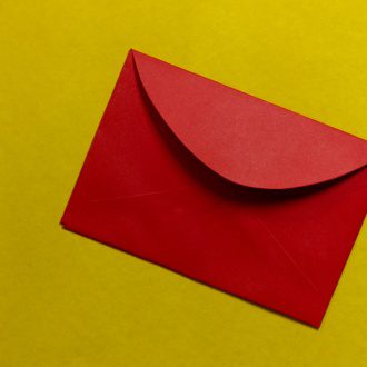 A red envelope on a yellow background