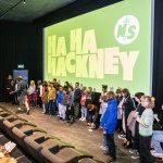 All the young writers stand in front of the Curzon cinema screen to take a bow