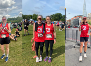 Four runners, wearing the Ministry of Stories runners vest, pose after their races fresh faced and smiling in the sun.