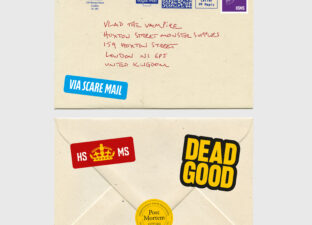 An envelope addressed to Vlad the Vampire, covered in bright colourful stickers